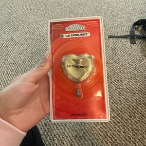 Le Creuset heart knob.